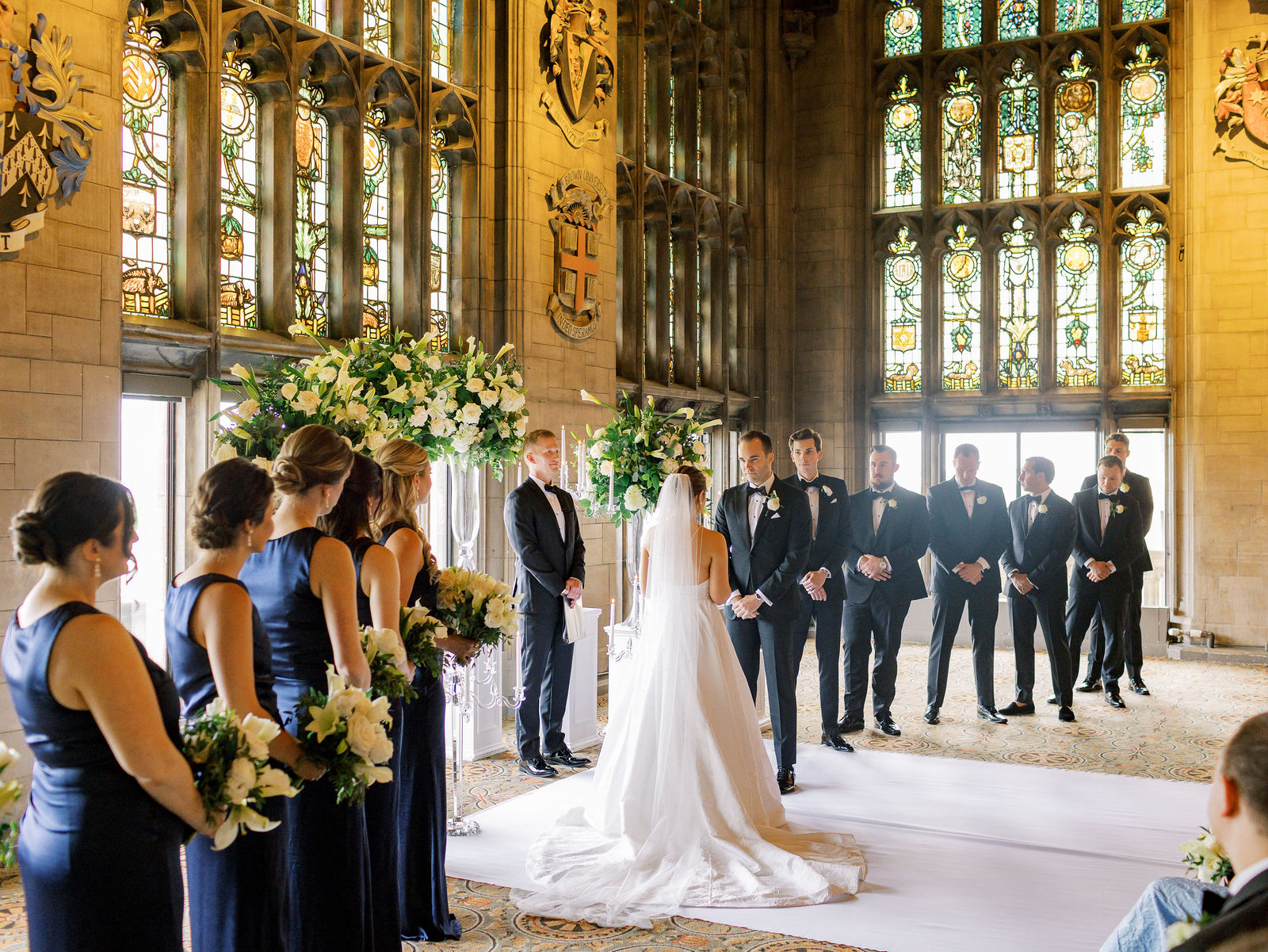 Elegant indoor ceremony with stained glass windows at one of the best wedding venues in Chicago