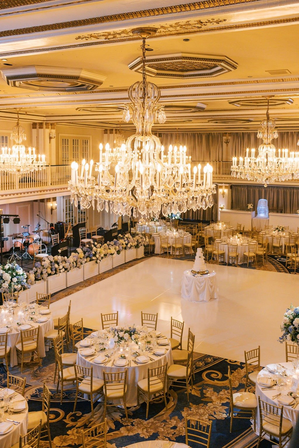Elegant ballroom setup with chandeliers at one of the best wedding reception venues in Chicago