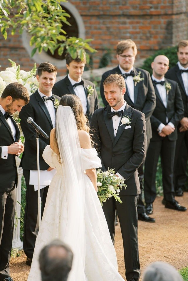 Outdoor ceremony with bride and groom exchanging vows at a wedding reception venue in Chicago